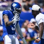 Aug 15, 2026; East Rutherford, New Jersey, USA; New York Giants wide receiver Odell Beckham Jr. (3) and wide receiver Malik Nabers (1) slap hands during warm up?